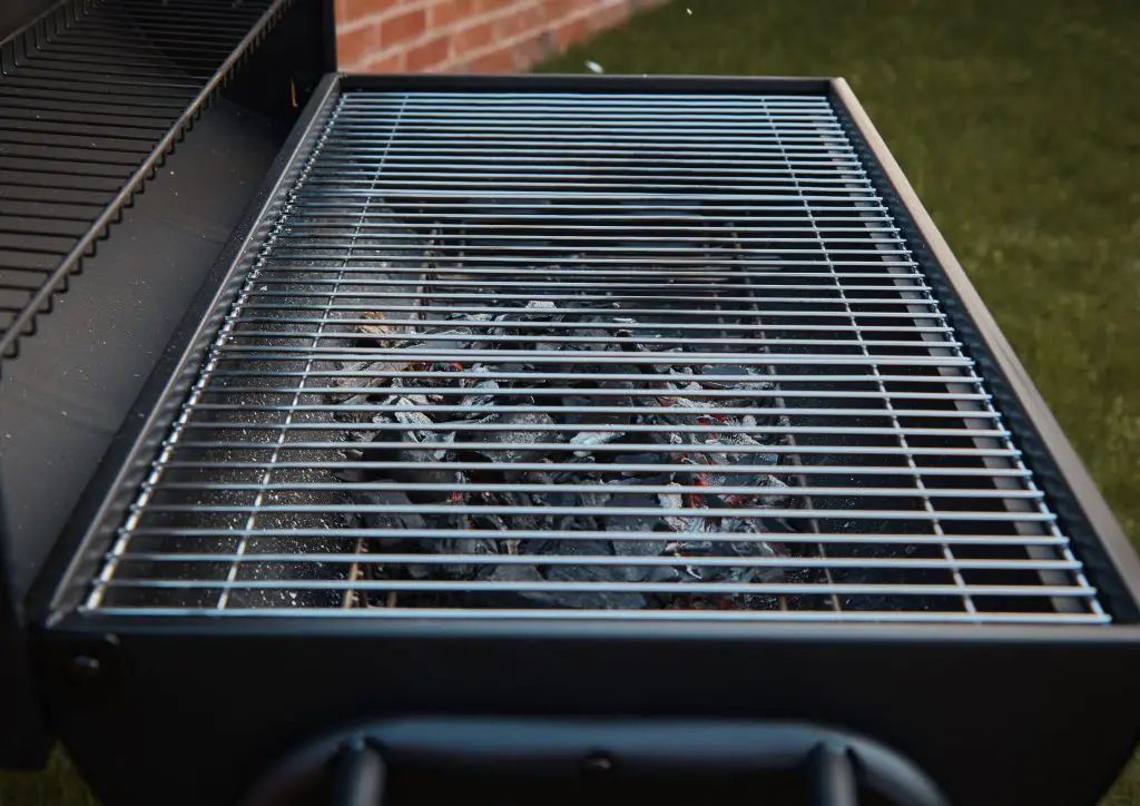 accessible coal bed in barrel grill